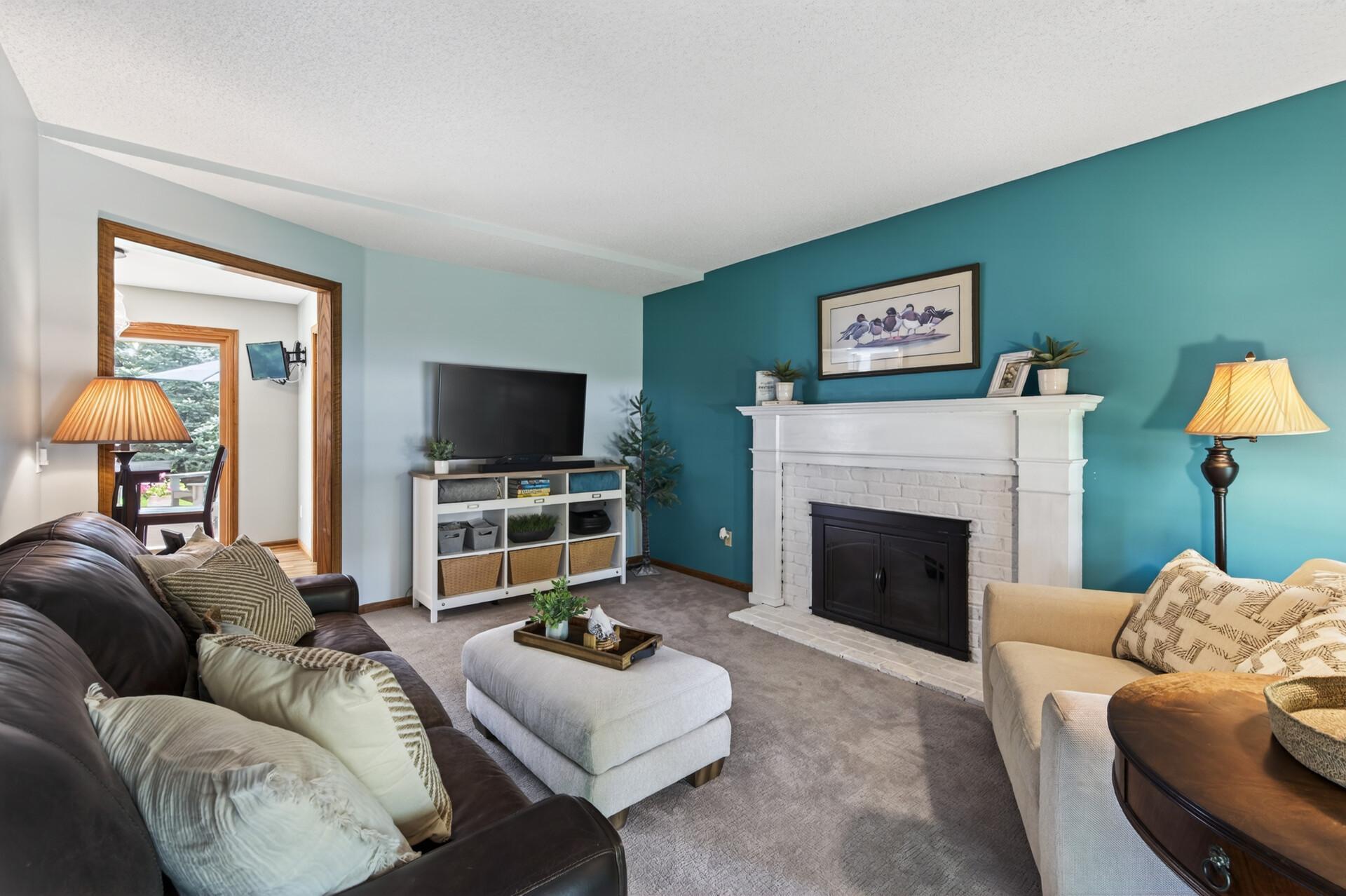 Cuddle up with a good book or watch your favorite show in this tranquil main floor family room