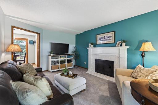 Cuddle up with a good book or watch your favorite show in this tranquil main floor family room