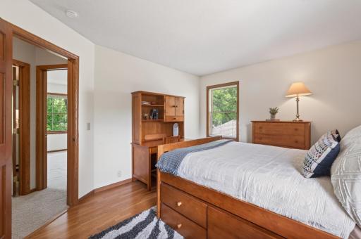 This room supports a full size bed, nightstand, dresser and a desk!