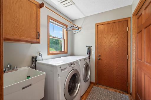 Staying up on laundry is a breeze in this location between the kitchen and garage. You'll love the giant storage closet too.