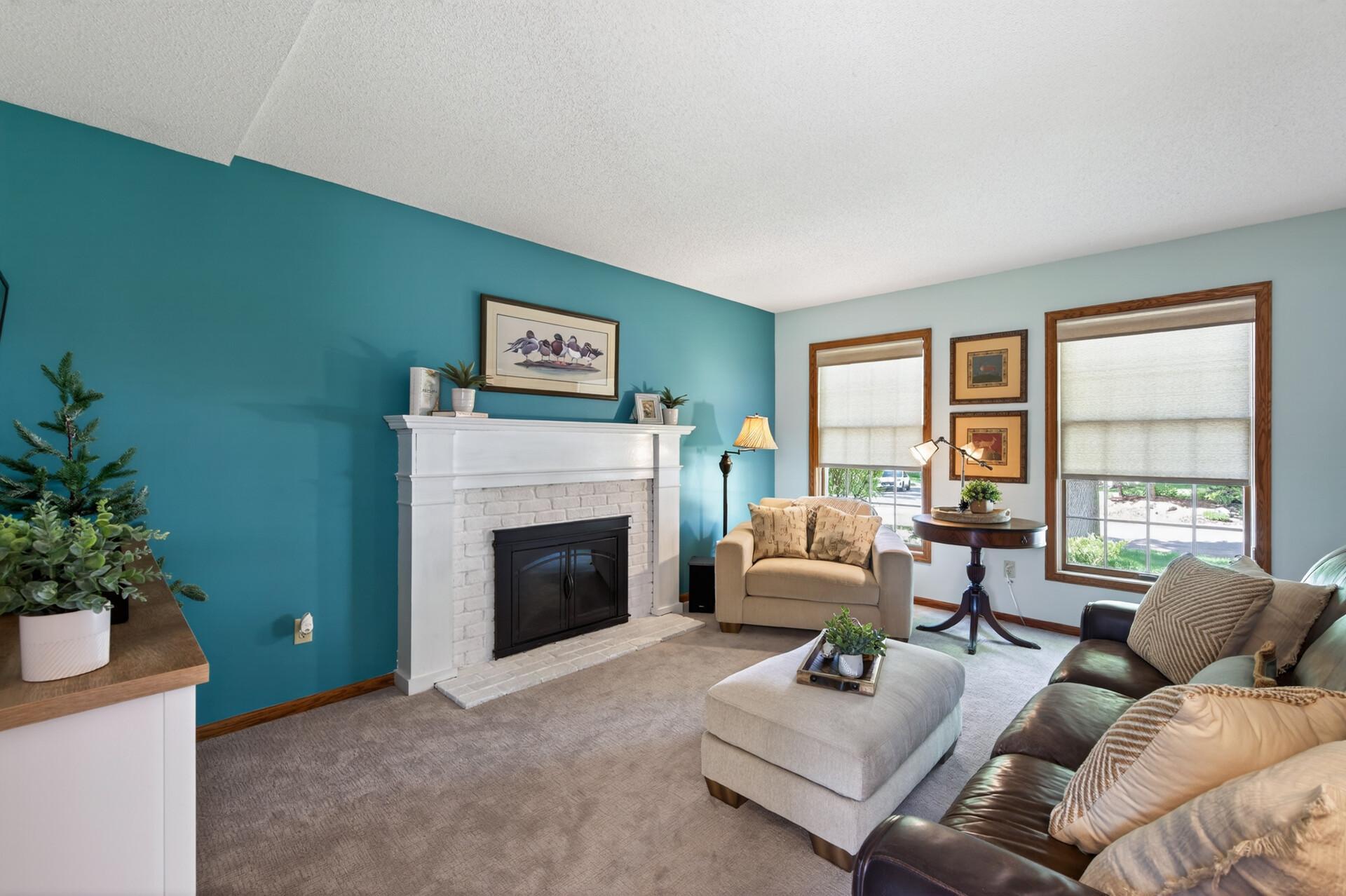 You'll enjoy comfort and relaxation with the gas fireplace with stately brick surround