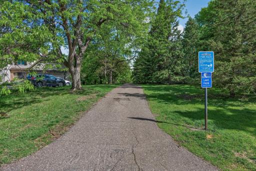 Just steps down the street is the walking path entrance to Schmidt Lake Park