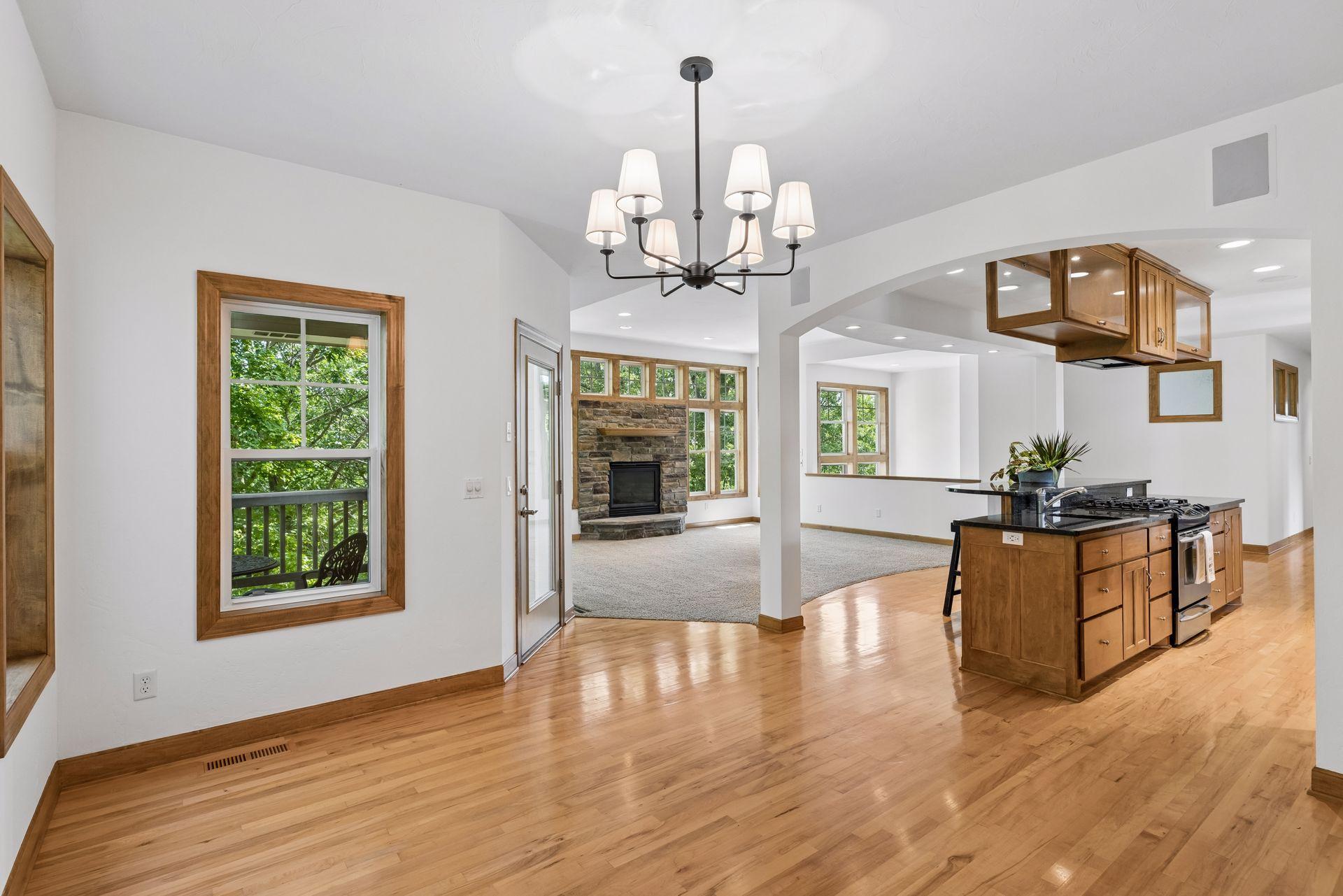 Dining area flows into the kitchen and main floor.
