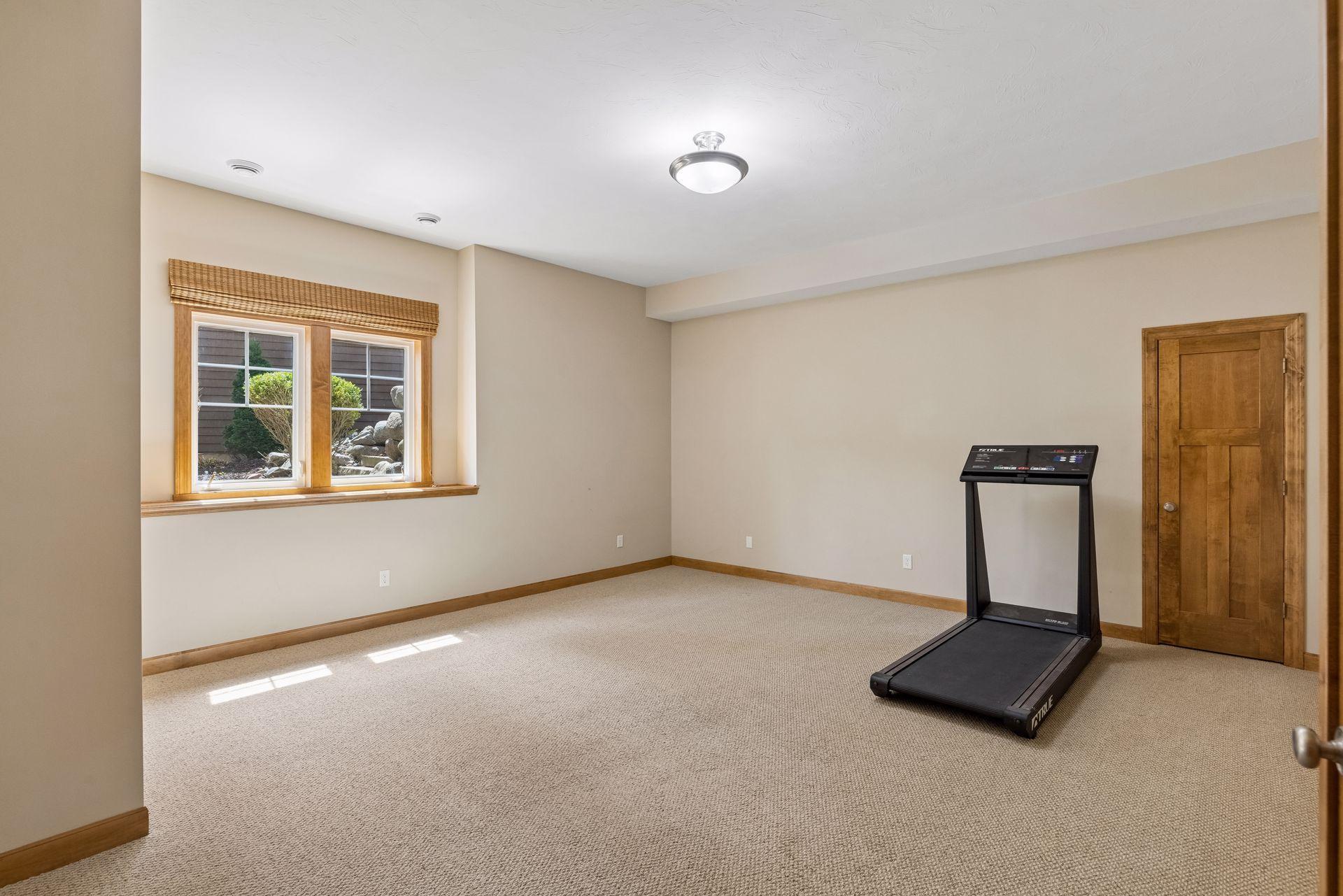 Huge fifth bedroom was used as a workout room.