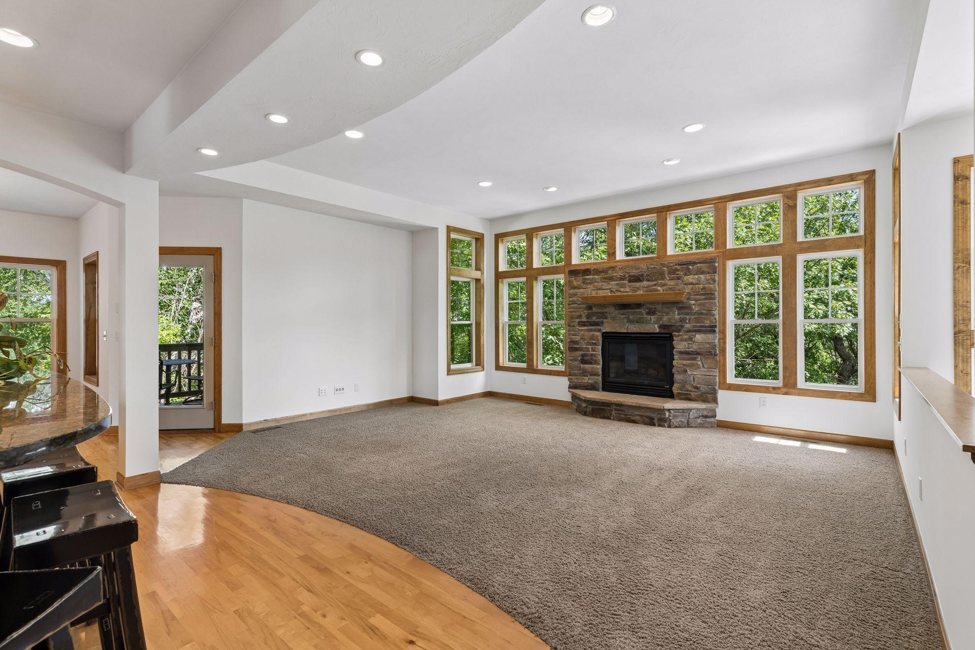 Your main gathering space with freshly painted walls, recessed lighting and an open main floor layout.