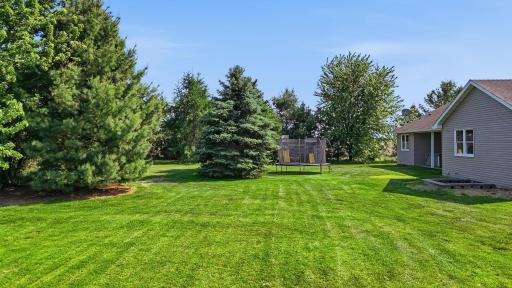 2 beautiful acres on corner lot!