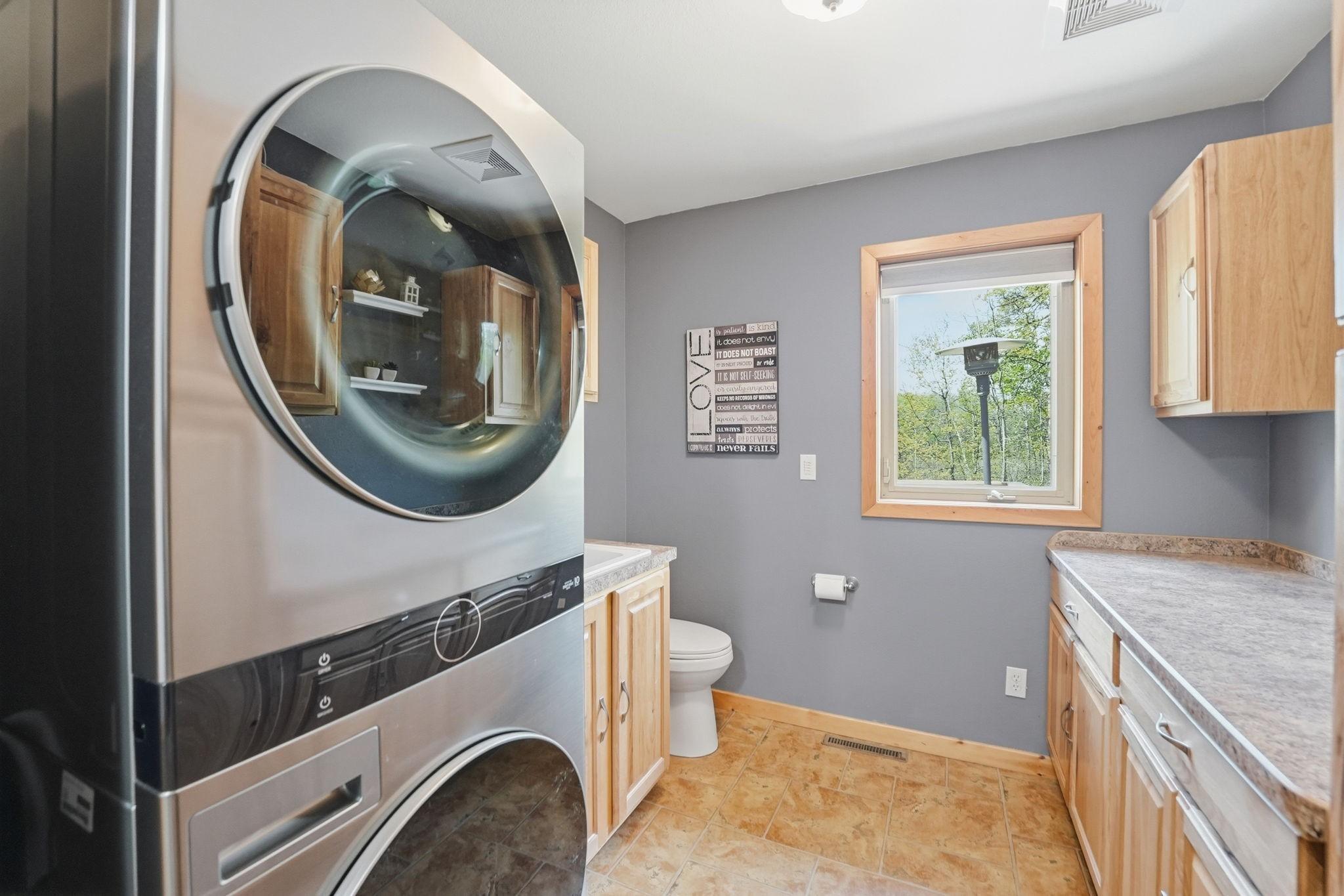 Main level laundry with 1/2 bath!