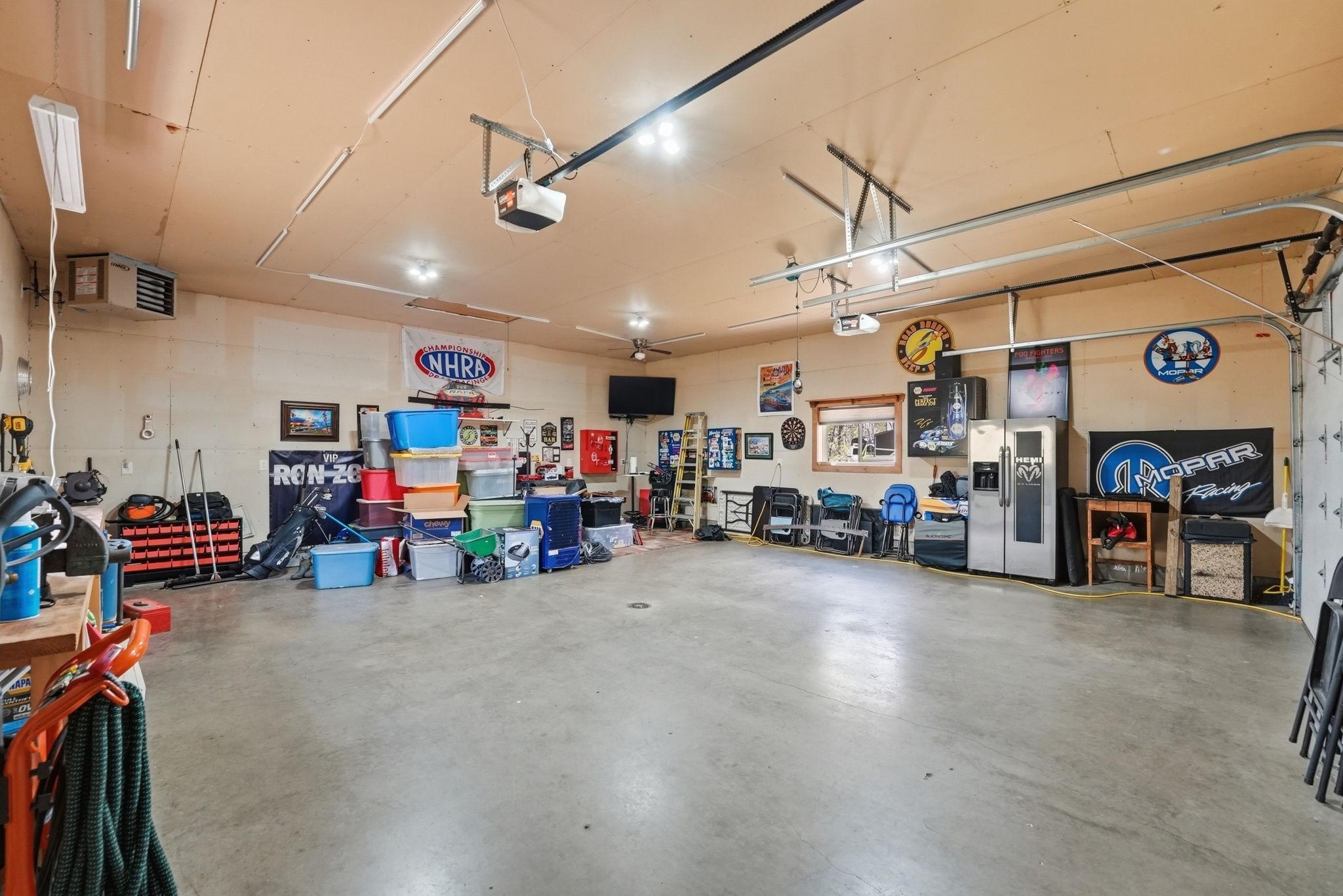 Detached 24x30 heated garage-Great space offering additional storage, workshop space.