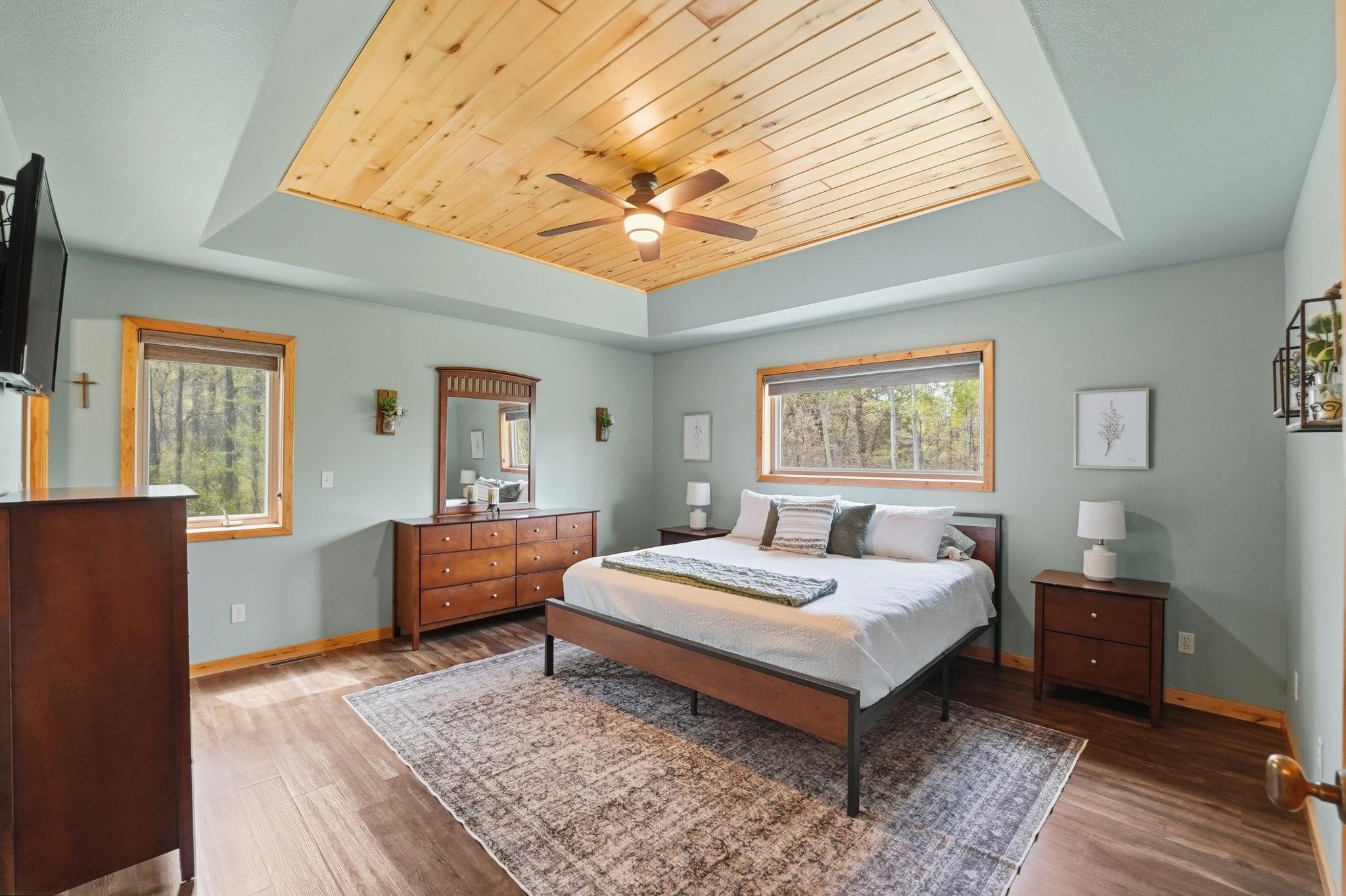 Main level master suite! Complete with private master bathroom and large walk in closet. Beautiful accent ceiling.