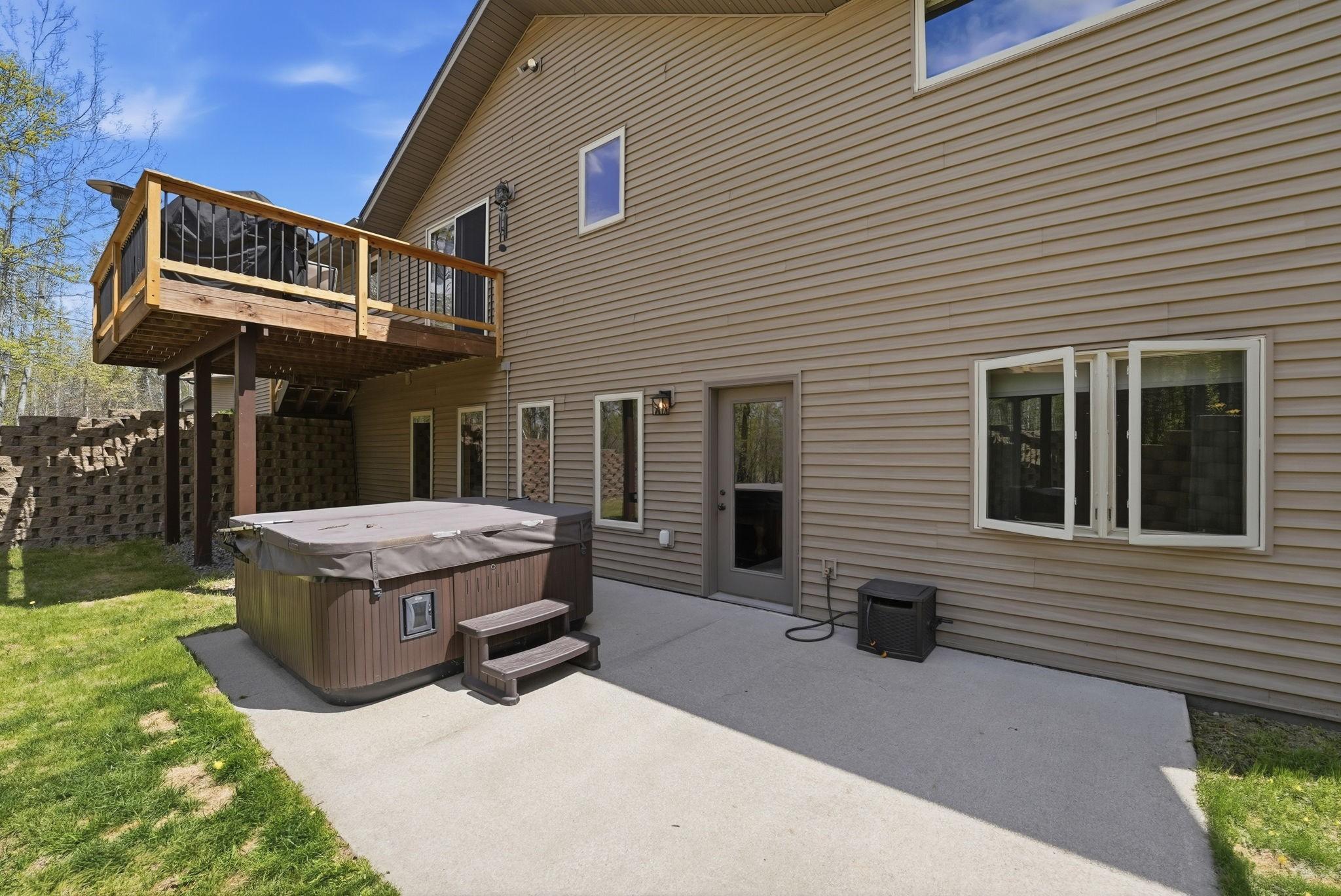 Concrete patio just off family room area. Great place to relax or entertain!
