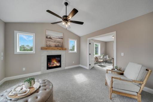Get a little cozier in the sun room with this beautiful gas fireplace.