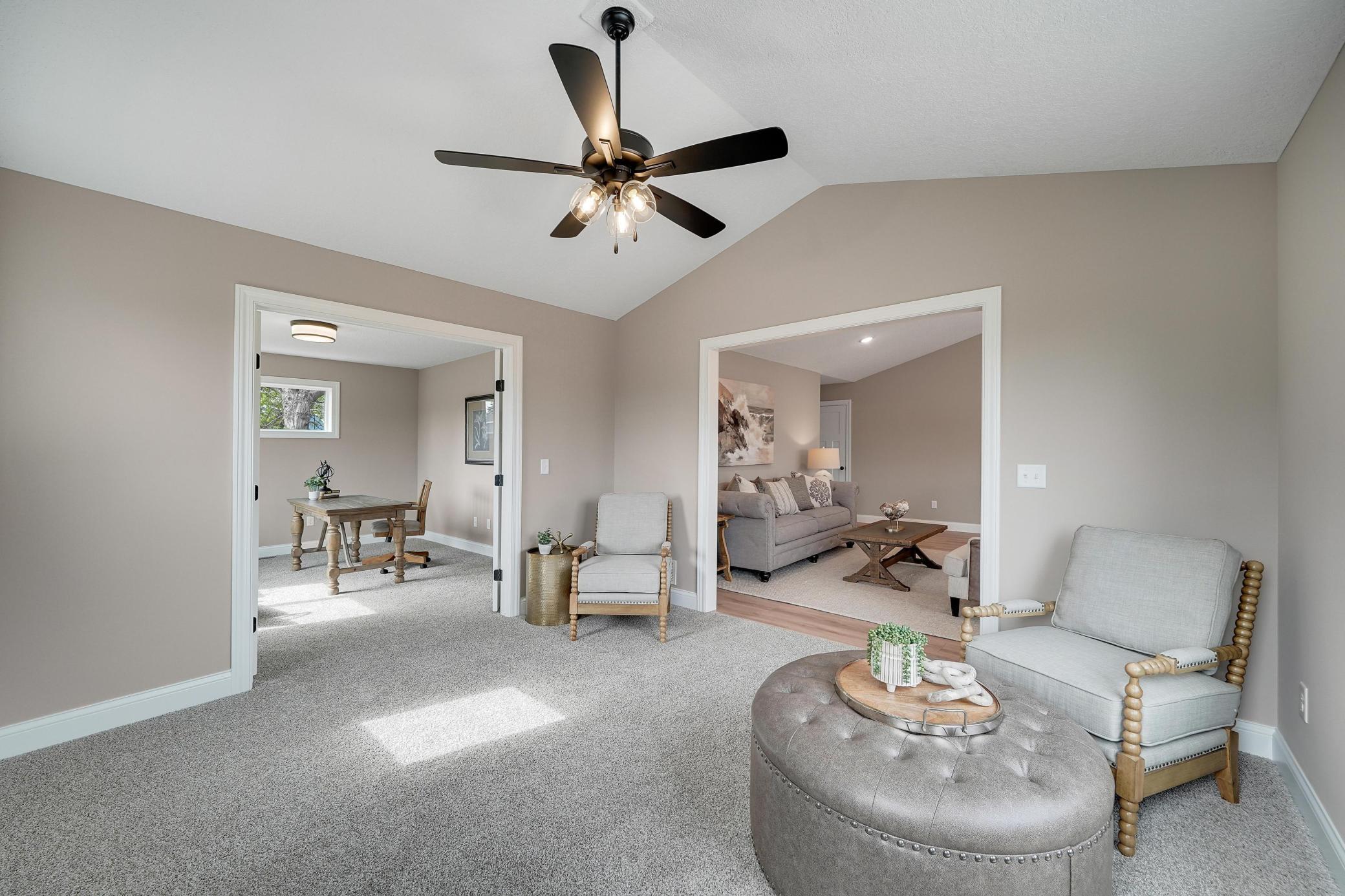 The sun room has access to the living room and home office.
