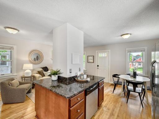 and seamless flow into the living and dining room spaces.