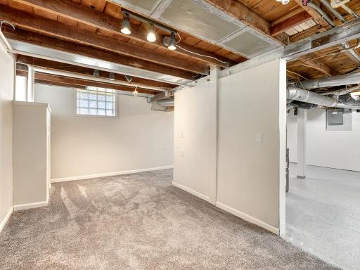 Partially finished lower-level adds valuable extra living space ideal for movie nights, a home office, workout area, or game room.