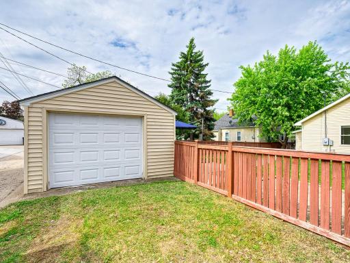 Single stall garage offers convenient parking and additional storage space.