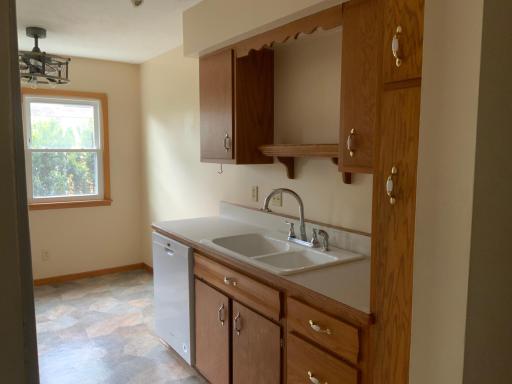 Nice deep kitchen ceramic sink! Small additional pantry.