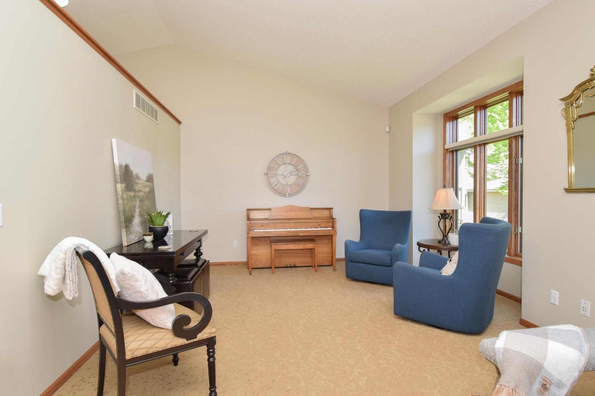 The Formal Sitting Room is Perfect for Conversation-Reading-Piano-Other Music? Your Passion? Size is Large to Accommodate Your Preference!