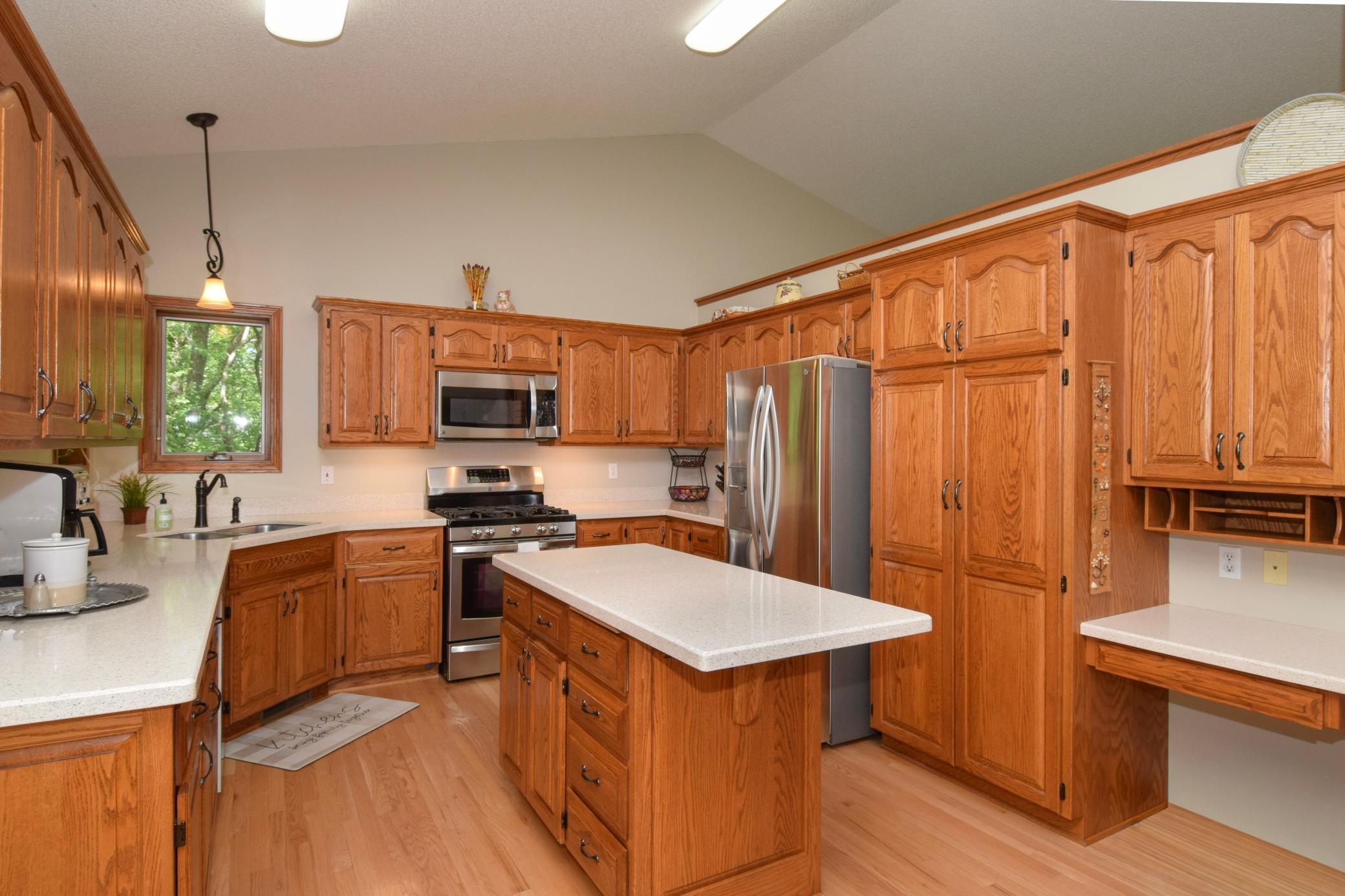 Vaulted Ceiling Offers an Open and Airy Feel-Transfers Light Throughout! And OHHHHHHHH Those Magnificent GENUINE OAK Matte Finished Floors-No Stain-All Natural!!! Gorgeous!