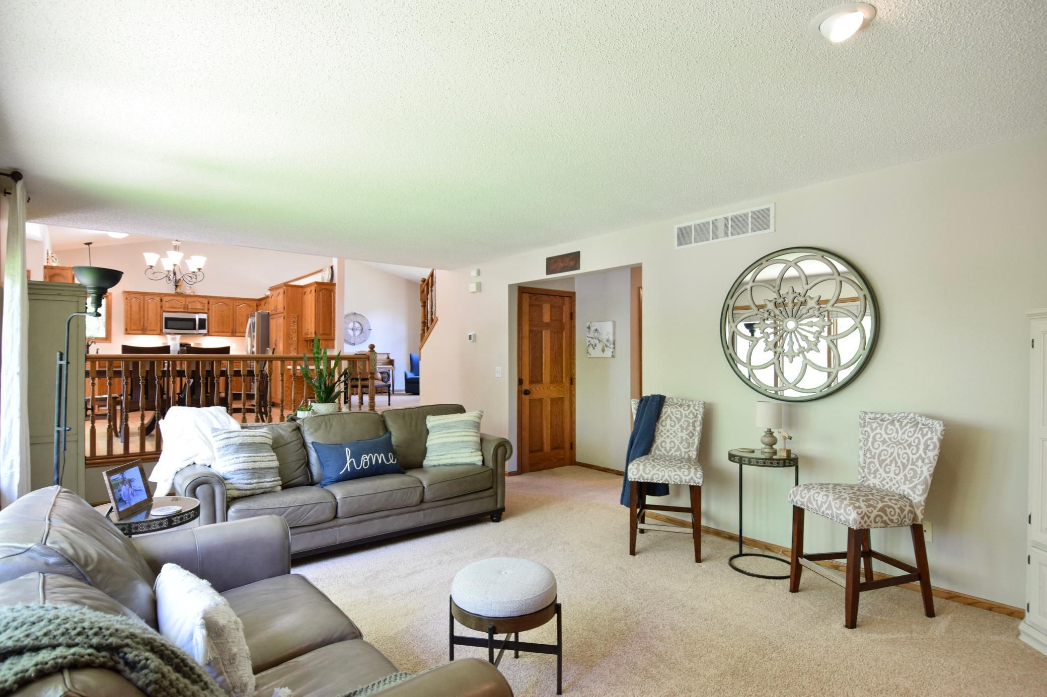 So Much Home Here! Great Pool for Summer-Beautiful Gas Fireplace for Cooler Months-Room to Entertain Every Day!!! Welcome Home to 14034 Palm St NW!