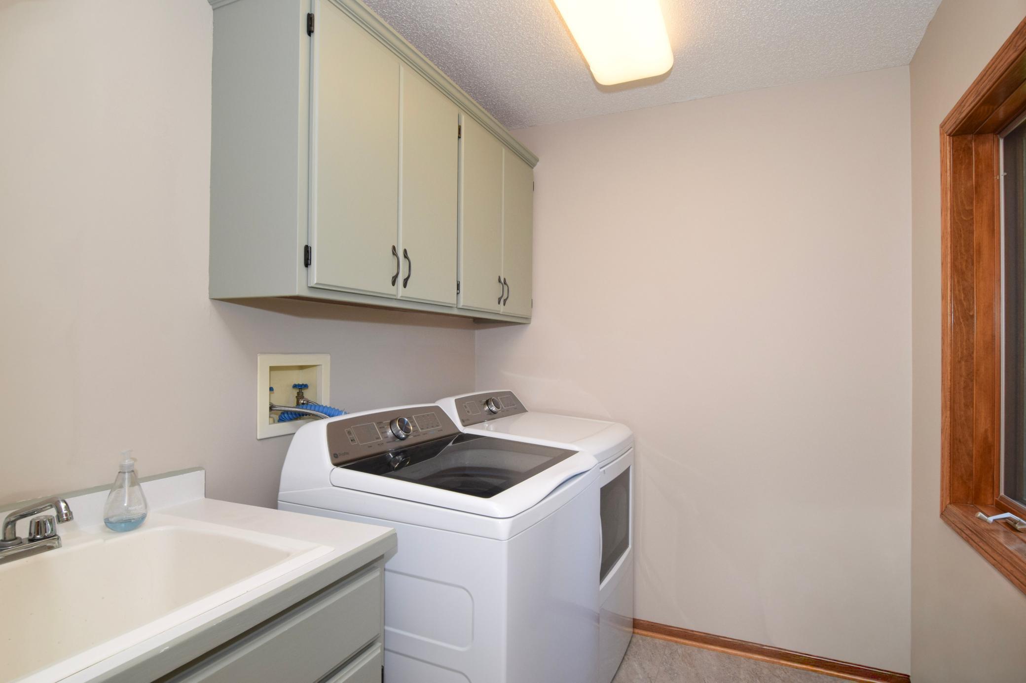 This Laundry Room is SO ADORABLE!!! Picture Cannot Do Justice-You Must See to Appreciate! You Will Love a Window in Here Too!