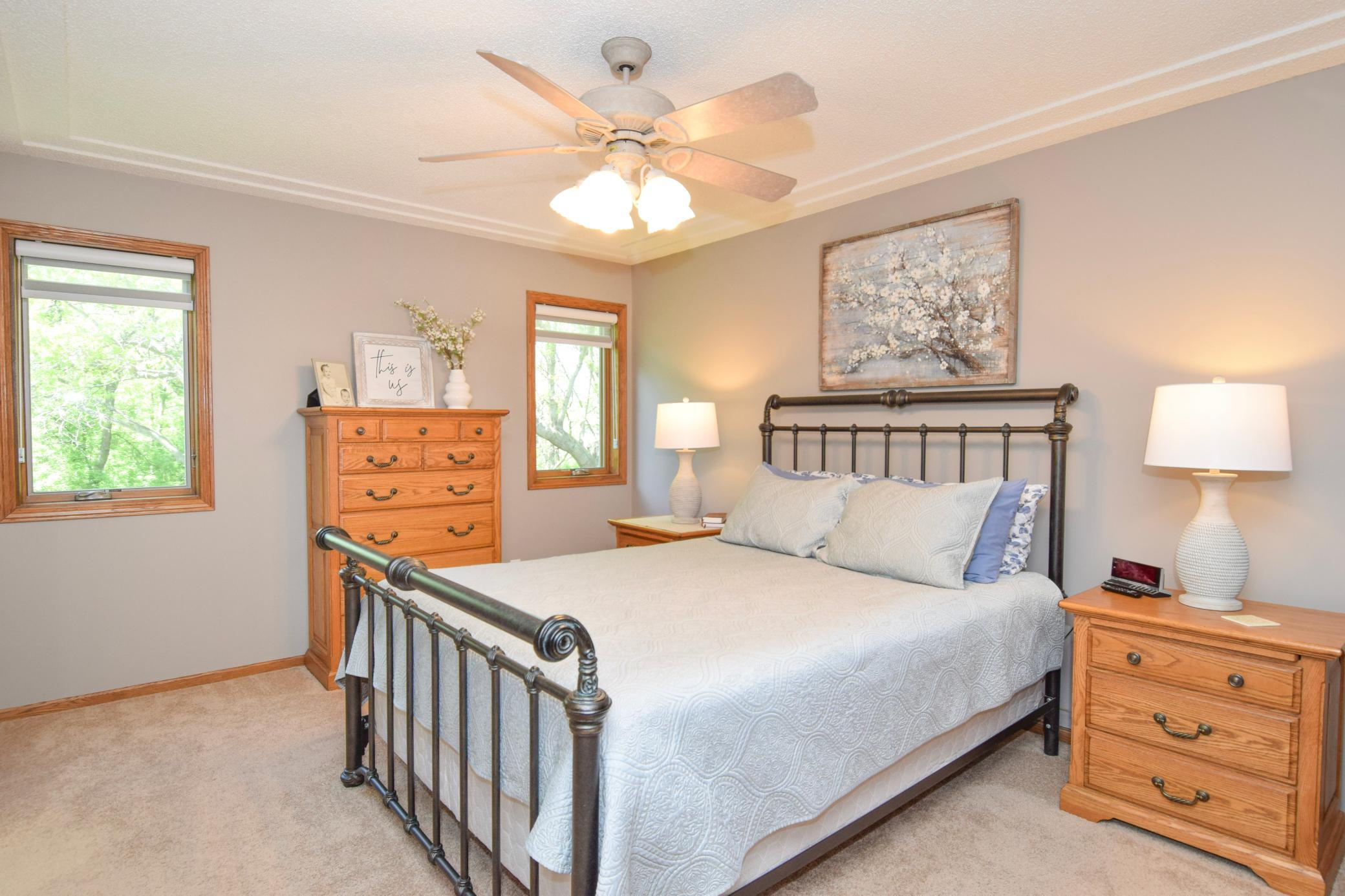 Find Respite in the Primary Suite...This Extra Large Room Boasts Two Windows Overlooking the Tranquil Wooded Yard-Including the Magical Fairy Garden Spot! Start and End Your Day With THE PERFECT VIEWS!!!