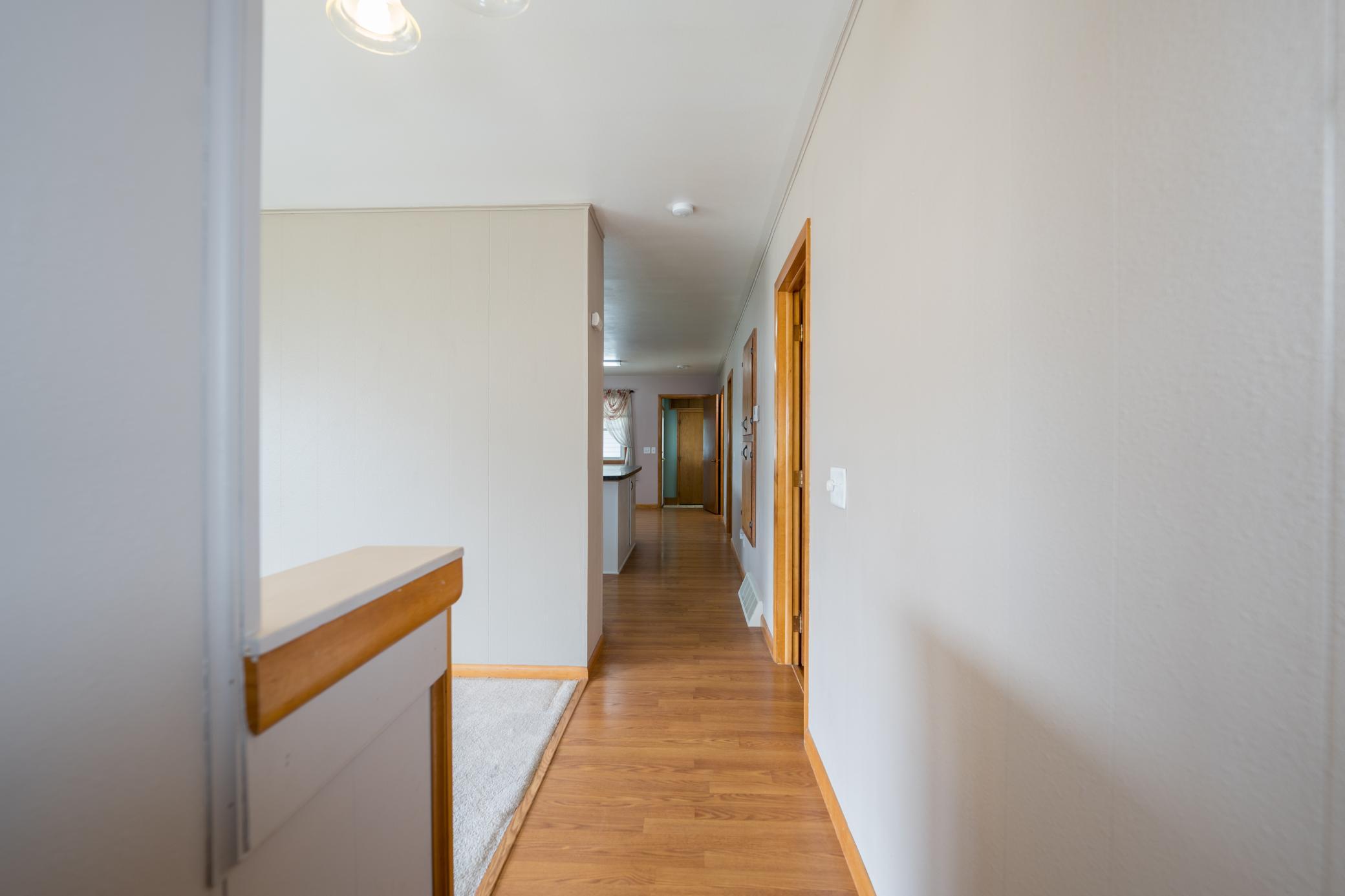 10-Hallway to bedrooms & kitchen.jpg