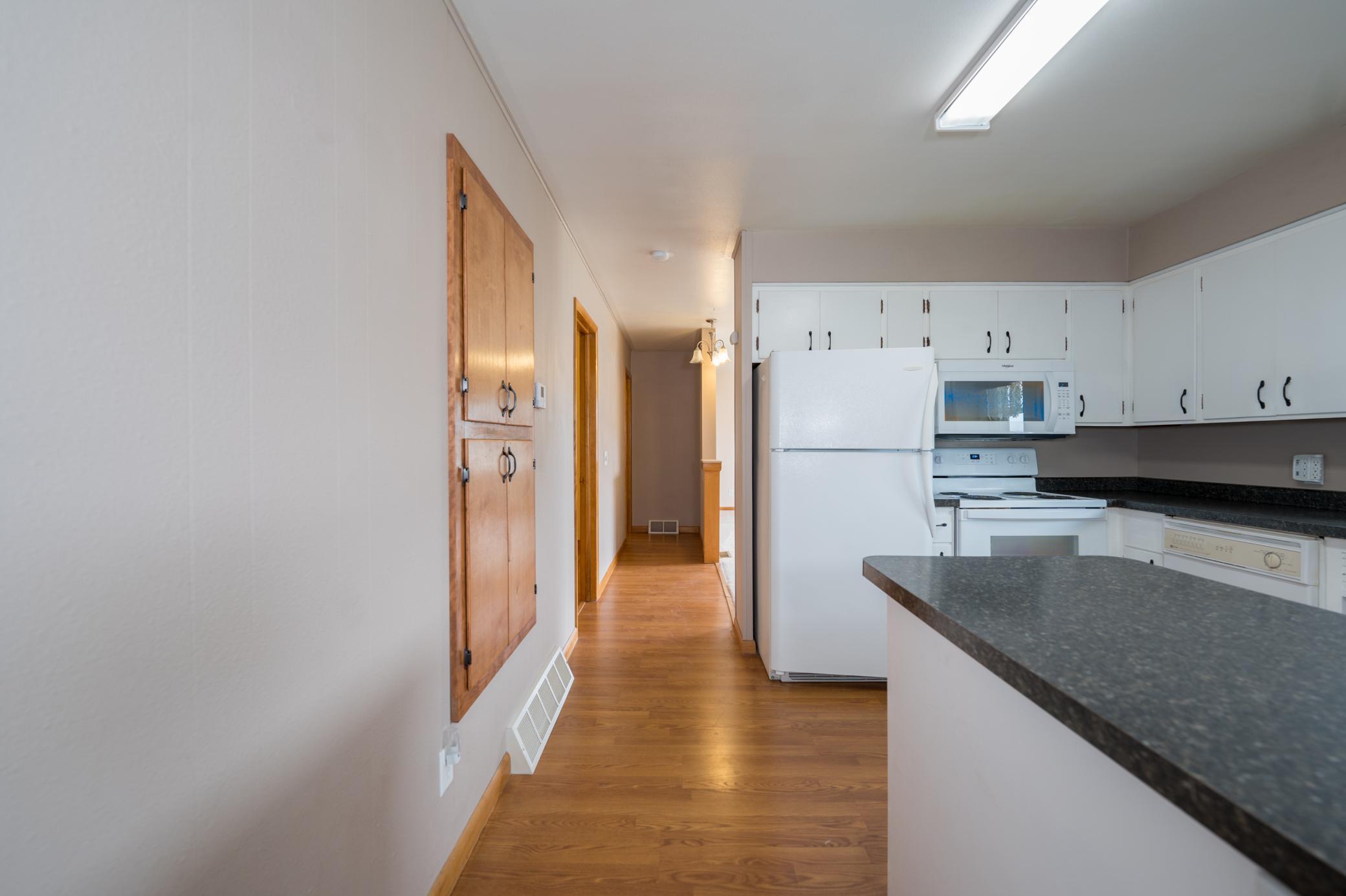9-Hallway to kitchen & bedrooms.jpg
