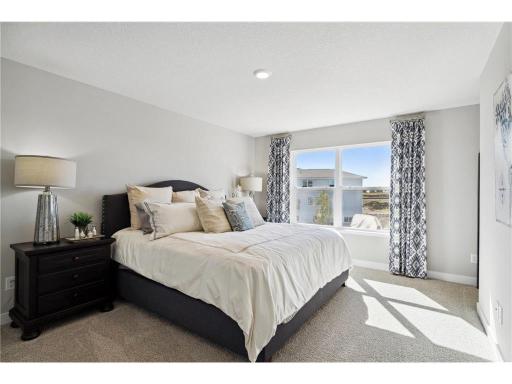 Primary bedroom features 2 walk in closets