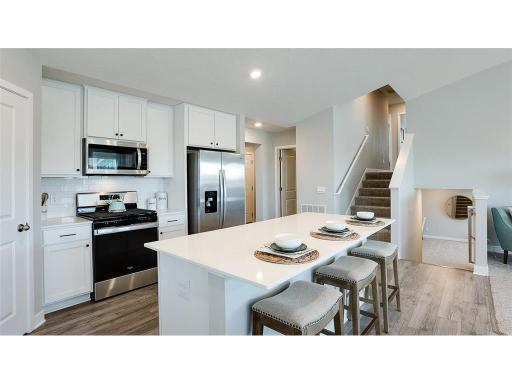 This impressive home features a modern kitchen with an open layout.