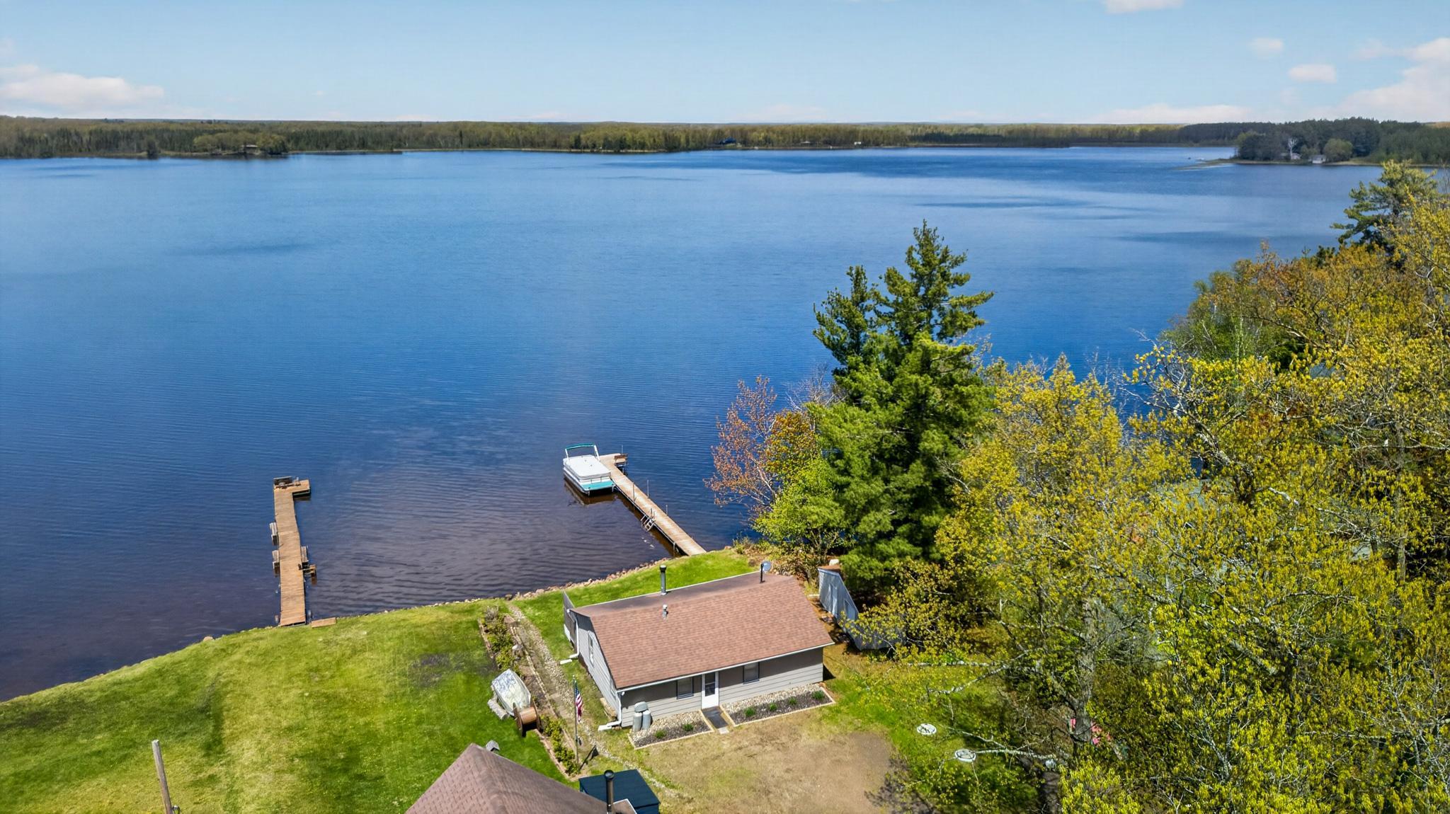 Welcome to this Wonderful, Affordable & Turnkey Seasonal Cabin on Lake Eleven!!