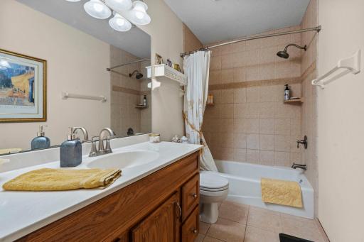 Primary bathroom is ceramic floors and tub surround. All bathrooms are ceramic tile floors
