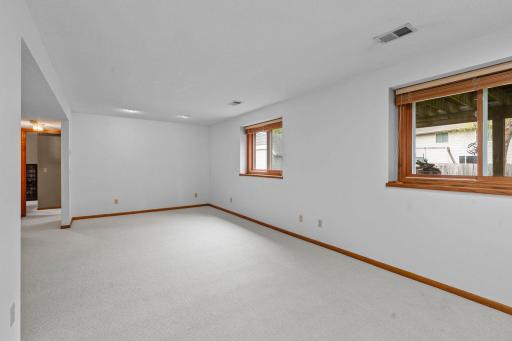 Family Room. May 2026: Painted and new carpeting installed