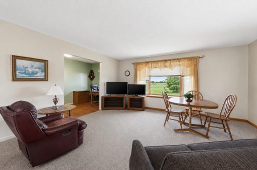 Open layout from kitchen, living room, looking toward the office