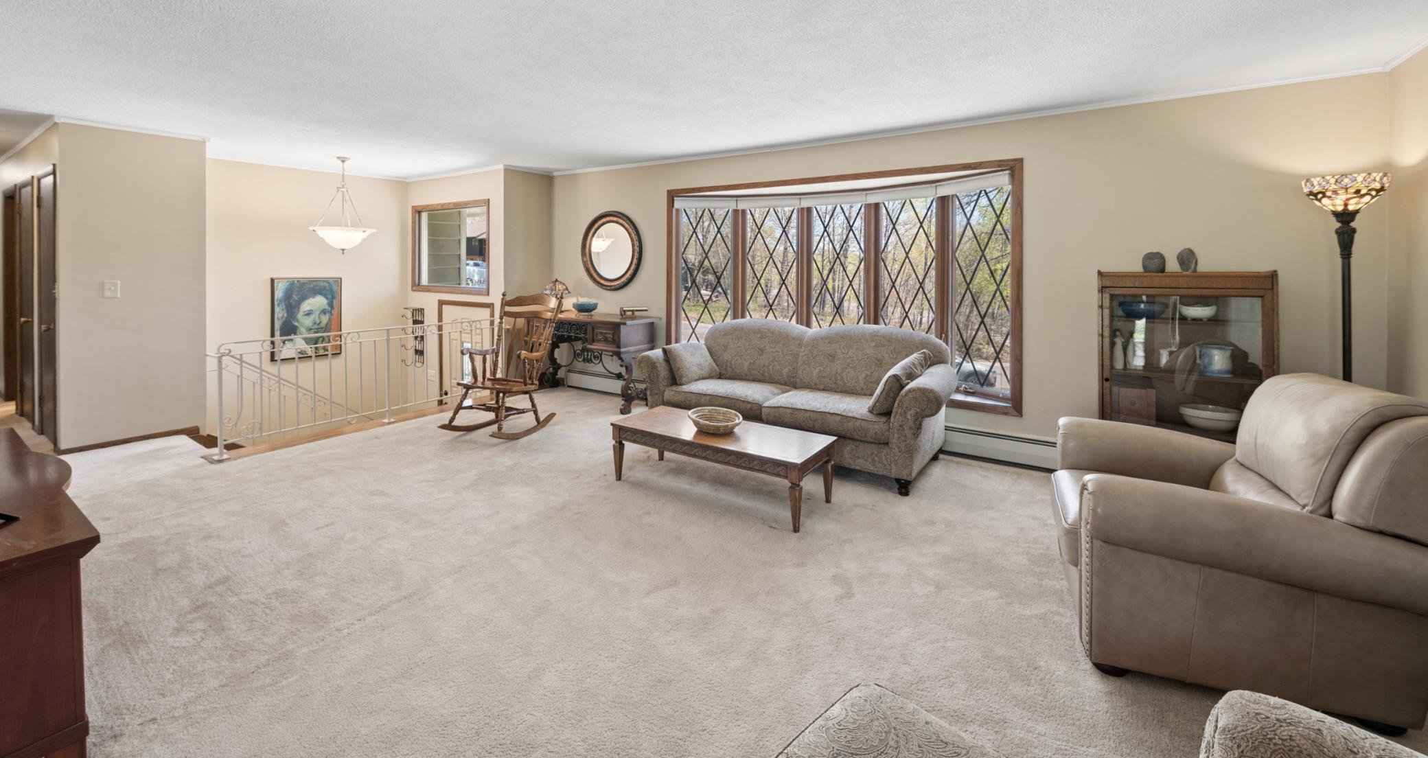 Spacious living room with an abundance of light