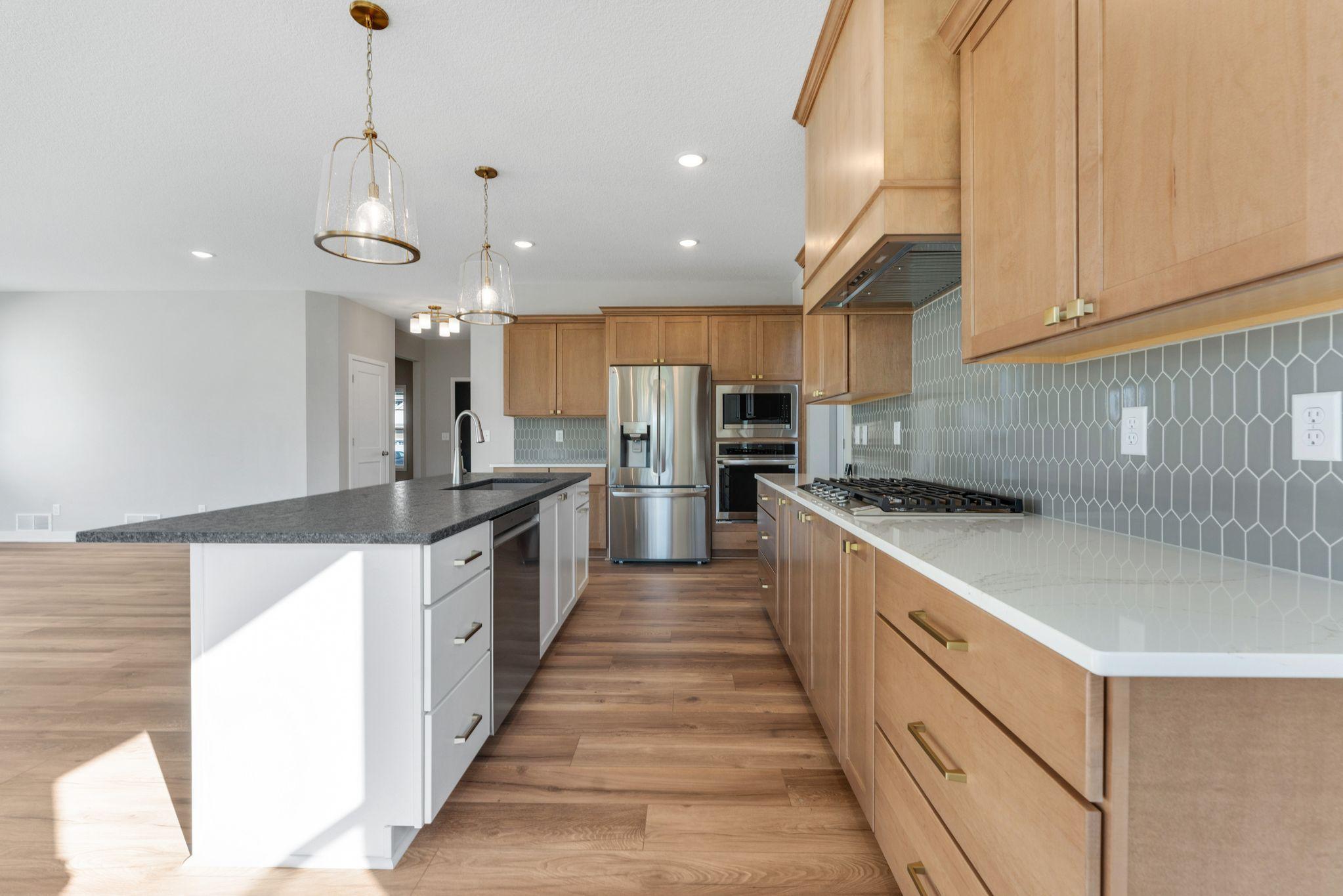 Enjoy this beautiful gourmet kitchen with stainless steel appliances.