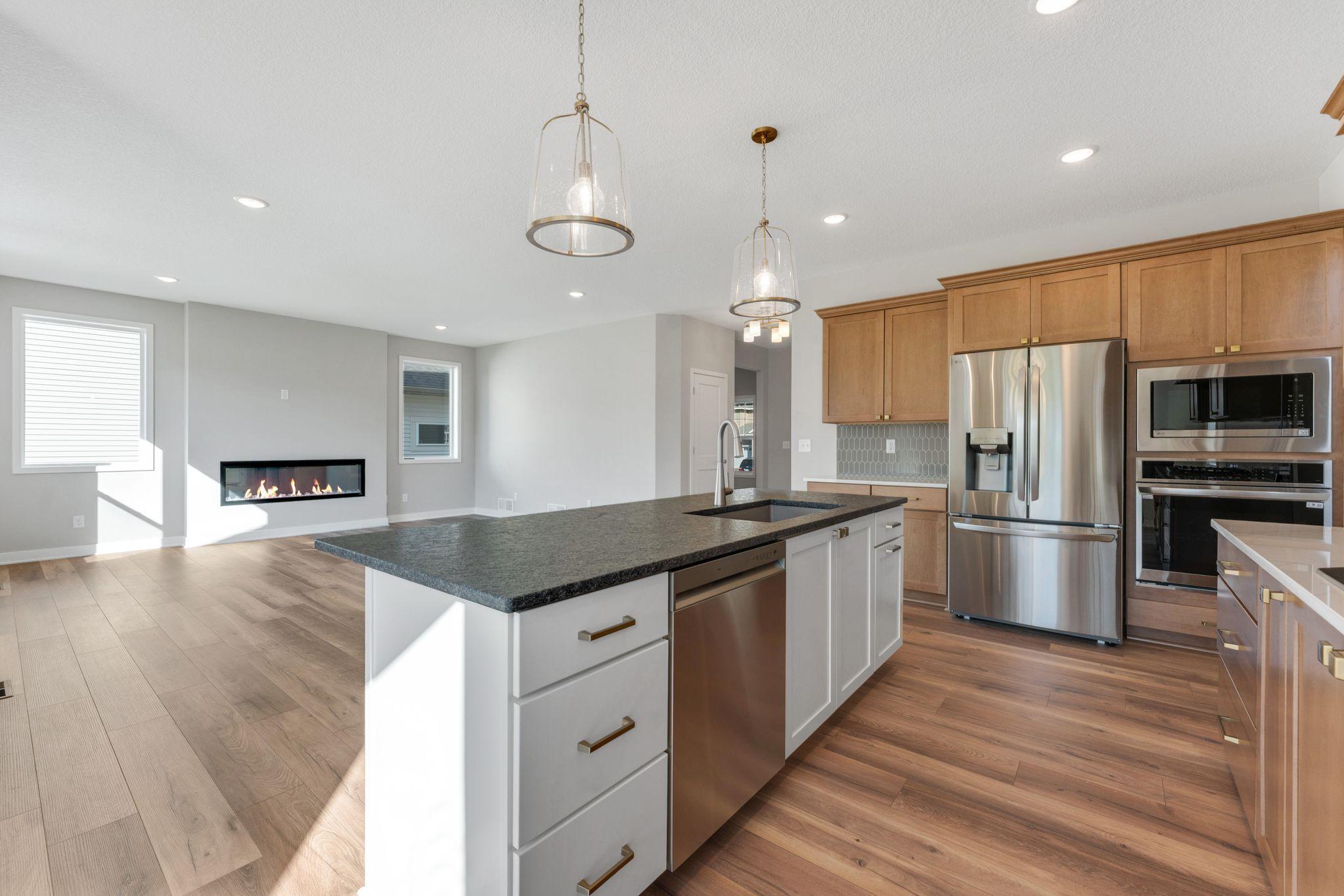Stunning gold hardware on the cabinets