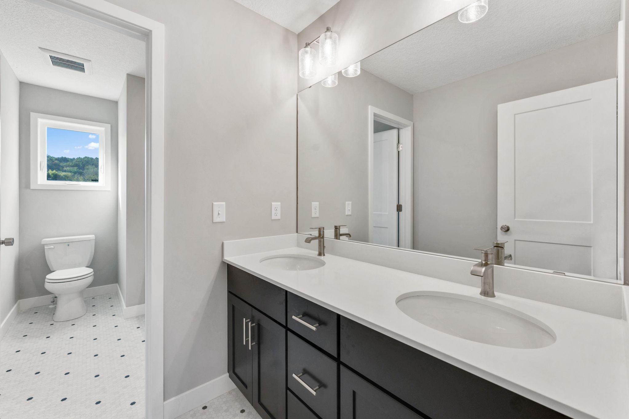 Upstairs bathroom with double vanity