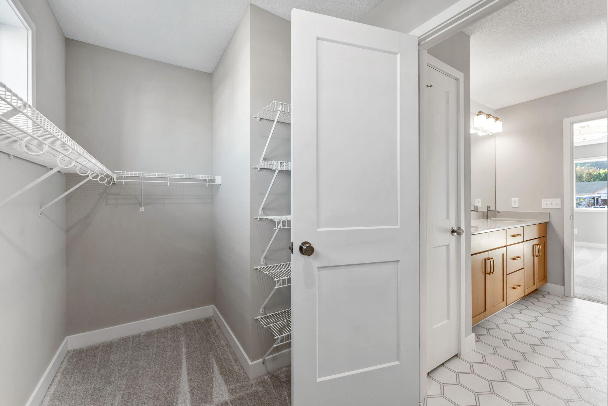 Primary closet with wire shelving