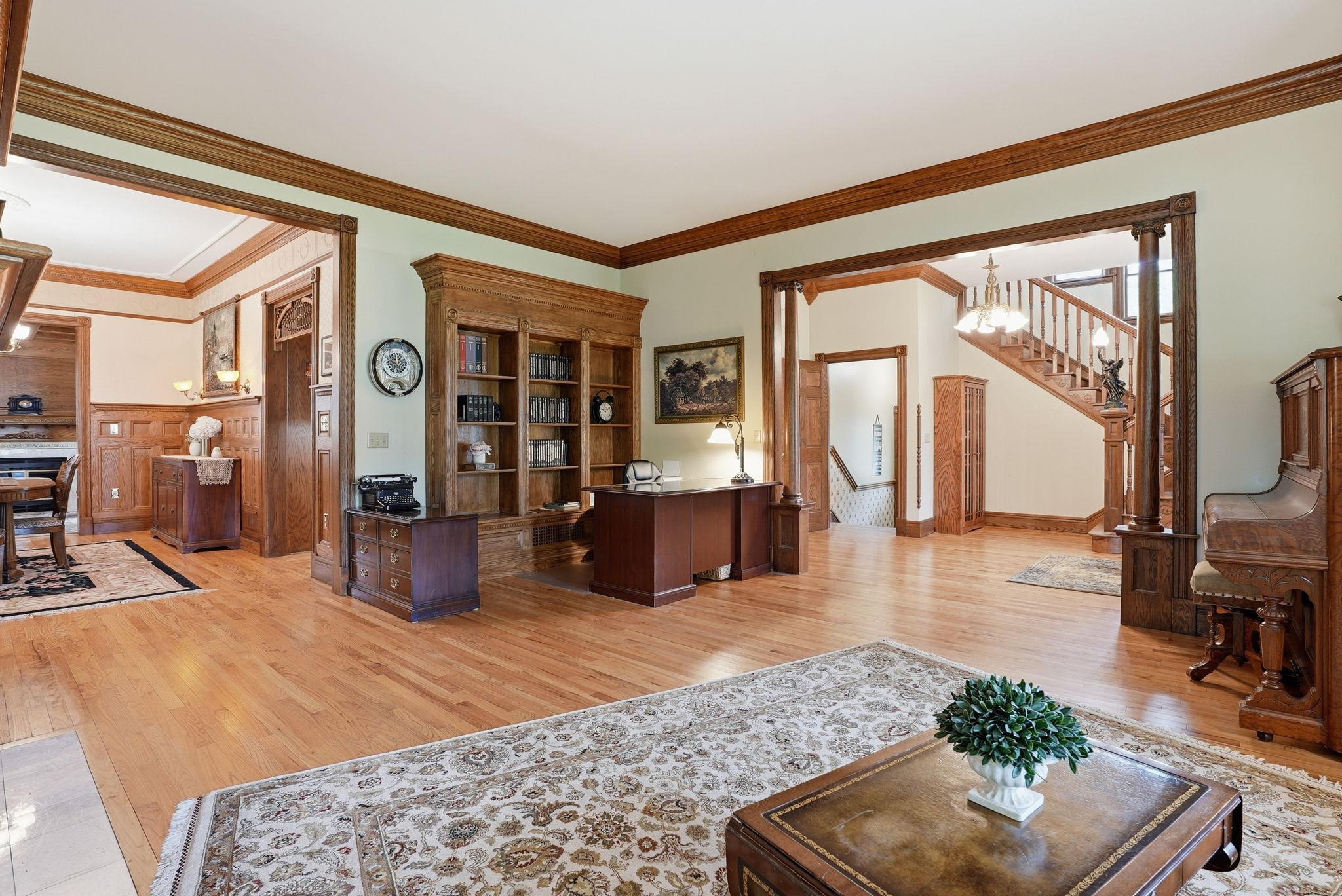 Reading nook offers a great spot for a desk, accented by built-in bookshelves.