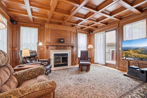 A reimagined sunroom, the parlor is complete with Andersen windows and patio doors.