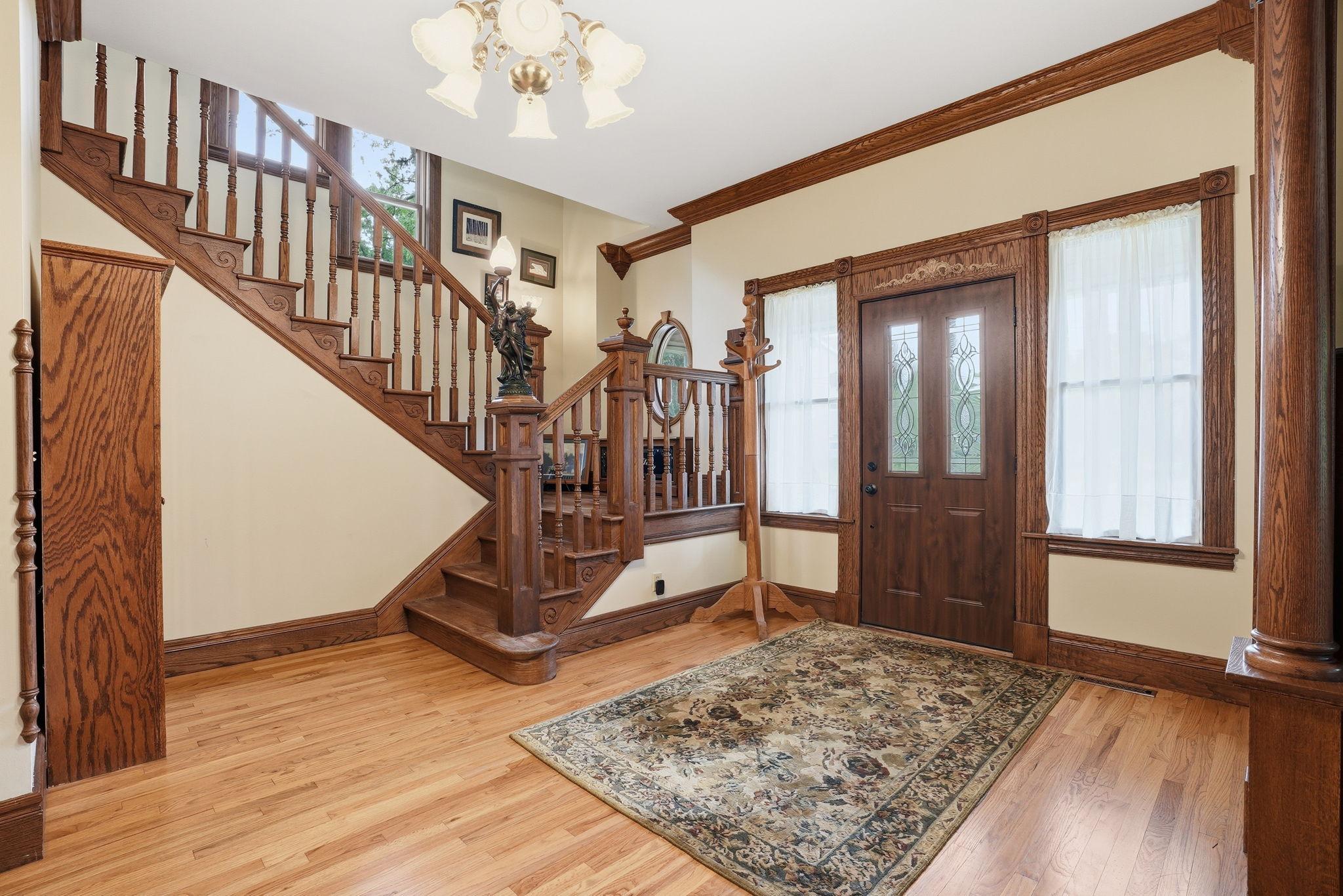 Stately foyer sets the tone of this striking home..