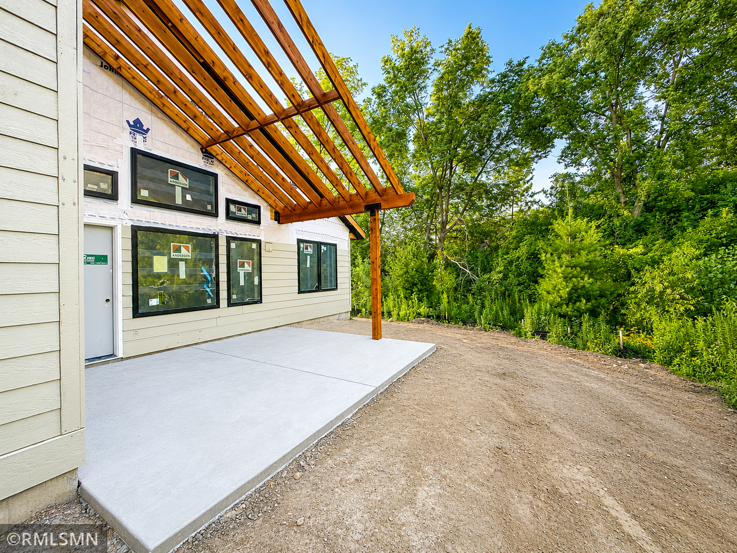 Sit on your patio with features a pergola & private nature views.