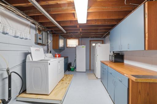 Laundry room in lower level with walk out