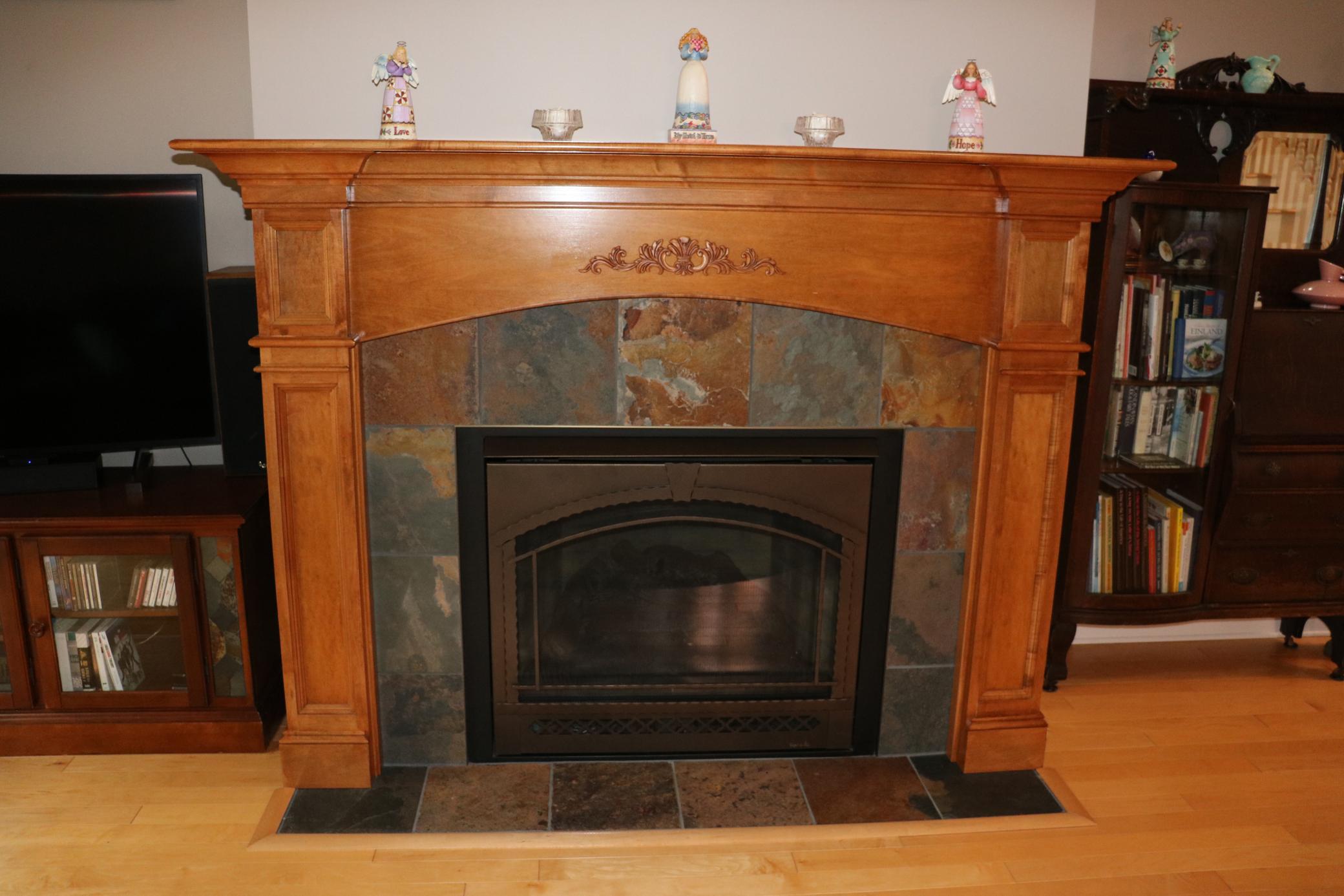 Gas fireplace can be programmed to start if the inside temp falls below a specific temp.