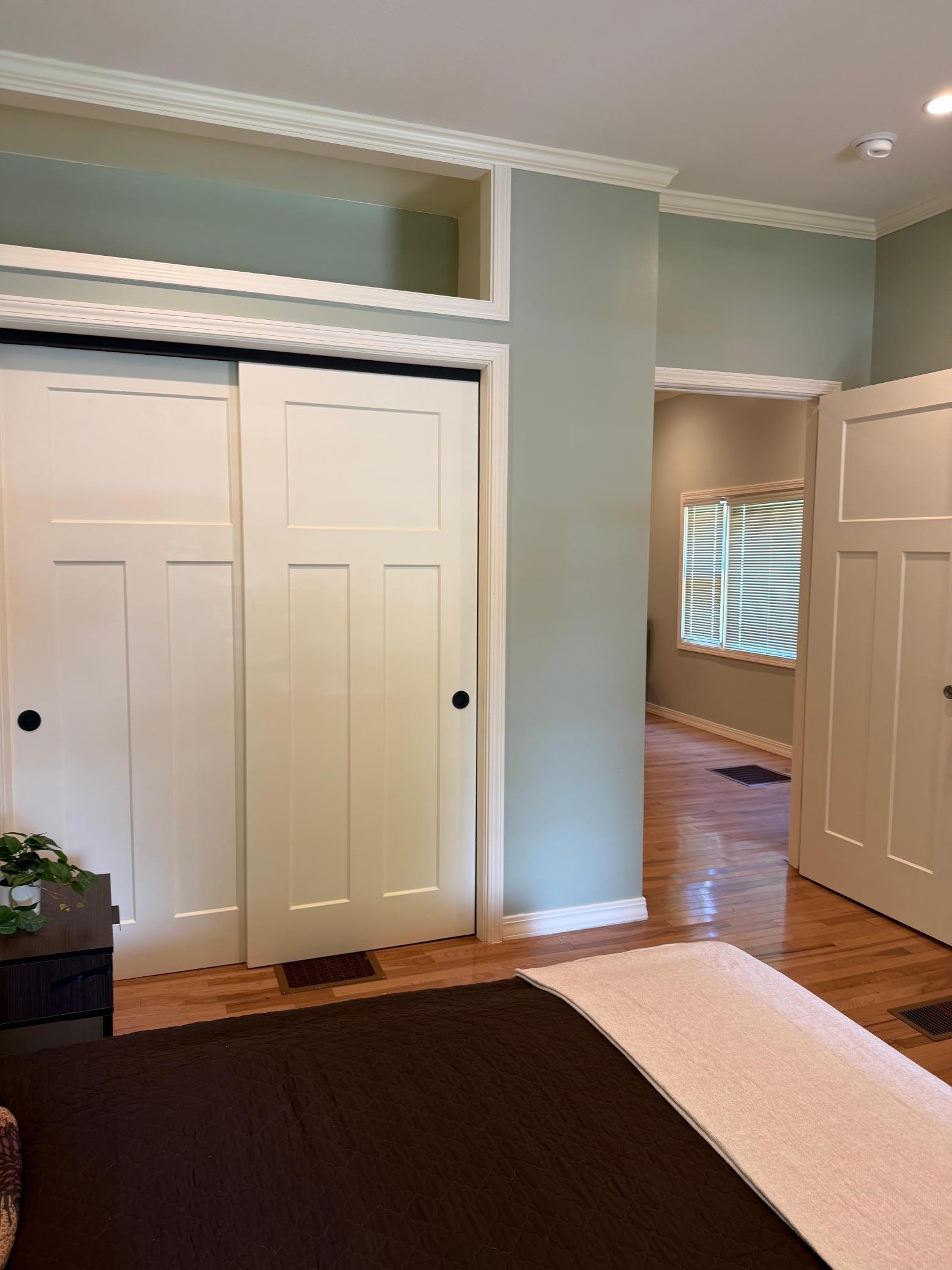 Main level bedroom to Living/Entryway
