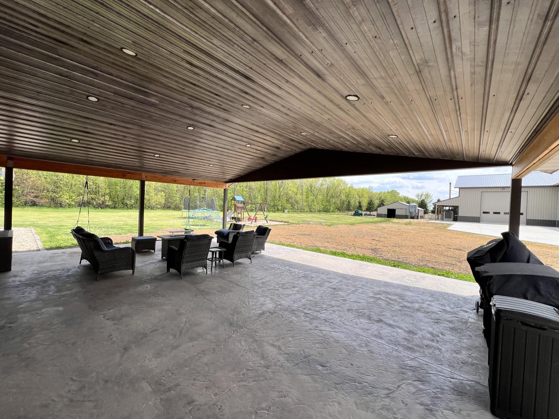 Covered porch with stamped concrete