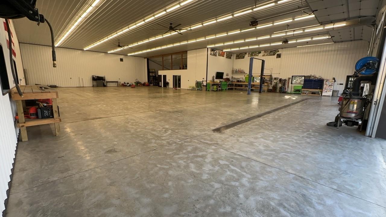 7,600 sq ft heated workshop with 18 ft sidewalls