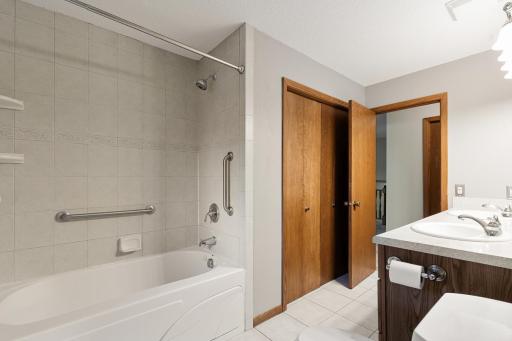 Full bathroom with double sinks and a jetted tub to relax and unwind