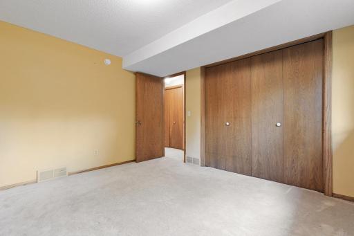 Lower level bedroom - so spacious. You'll love the wooden ledge for added character