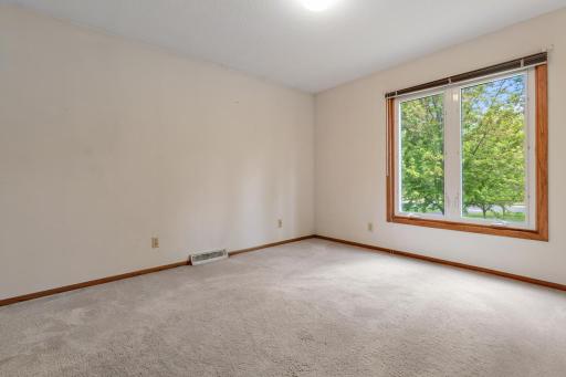 Another spacious bedroom with a walk in closet